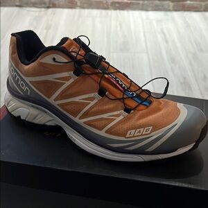 Salomon Orange and Gray Trail Shoes